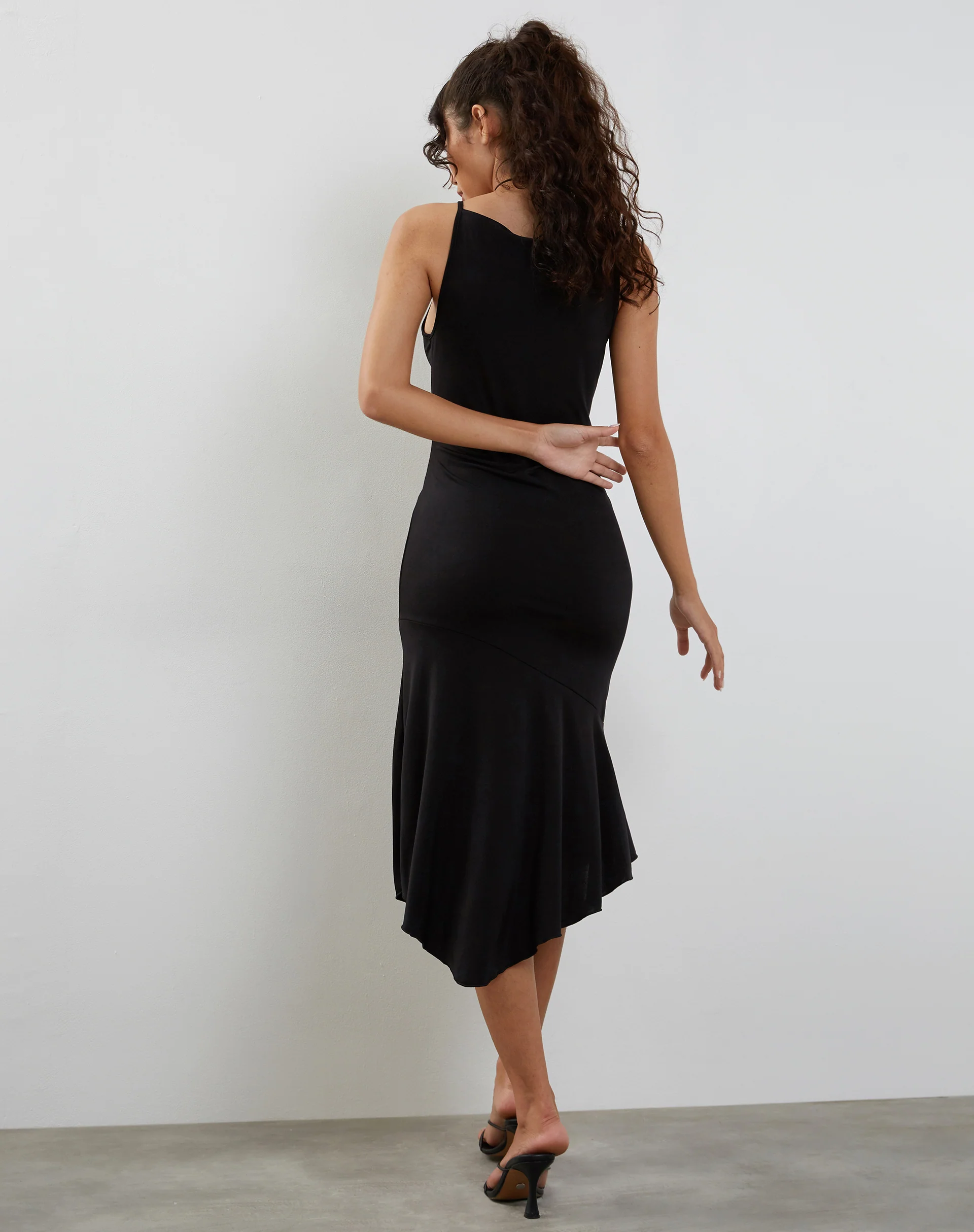 Adina Asymmetric Hem Midi Dress in Slinky Black - Image 4