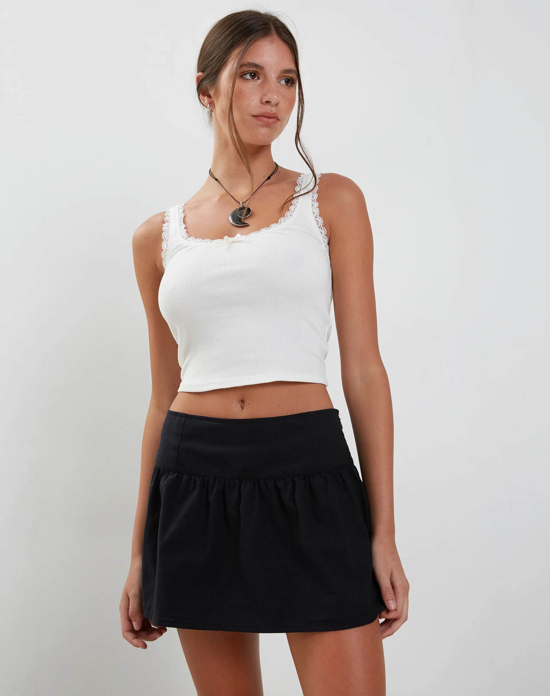 Adini Mini Skirt in Black Dobby - Image 2