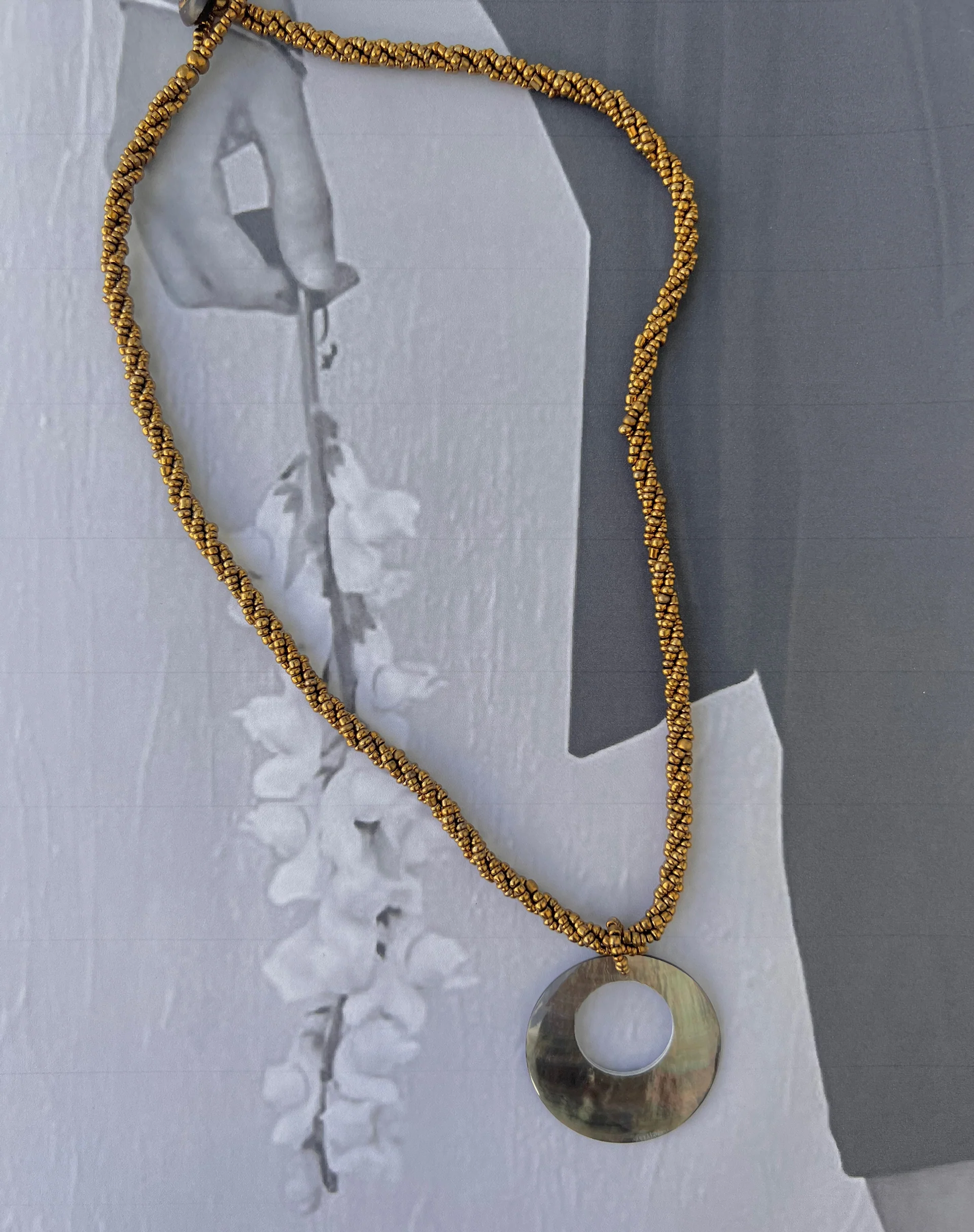 Arma Necklace with Round Shell Pendant in Gold - Image 4