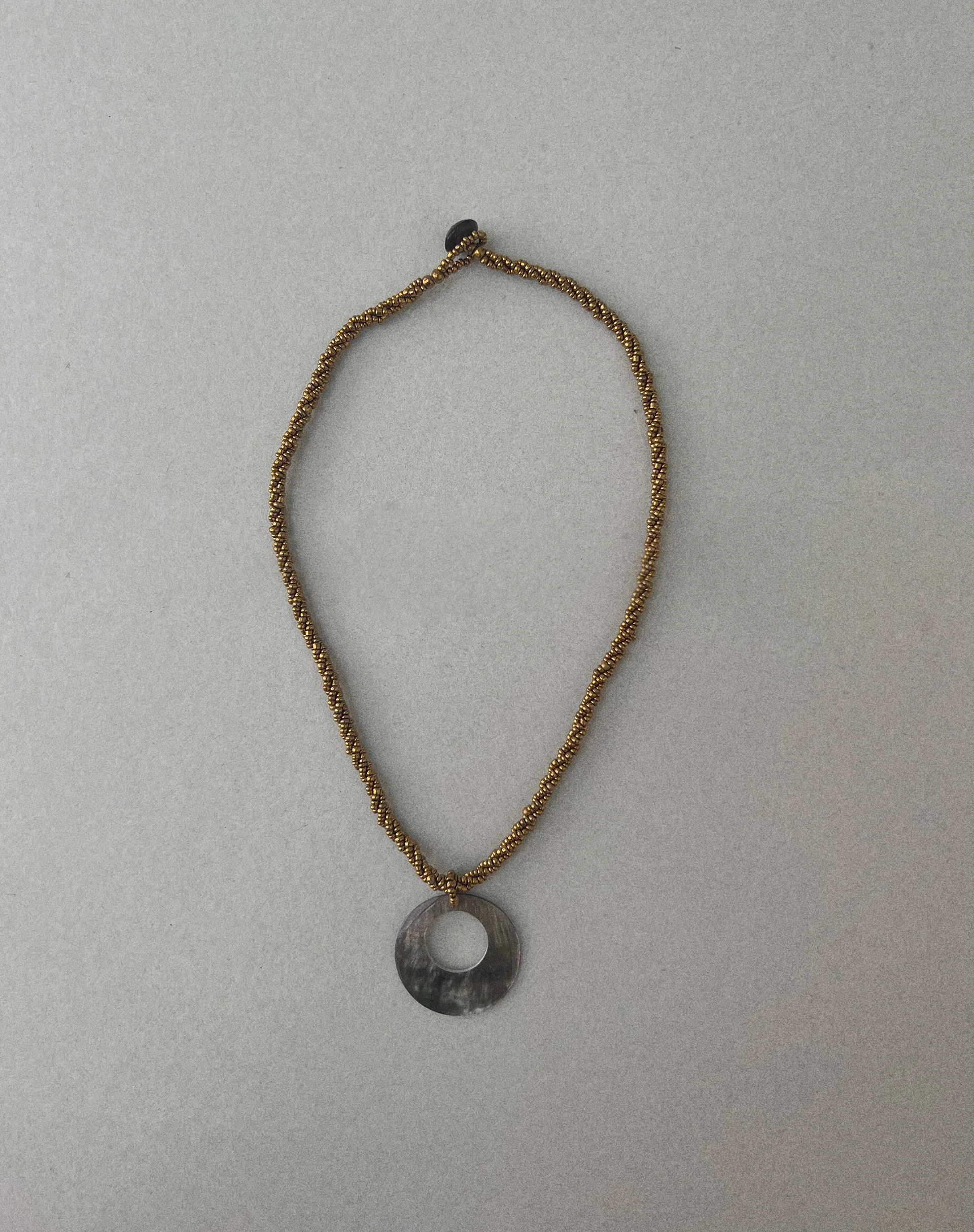 Arma Necklace with Round Shell Pendant in Gold - Image 5