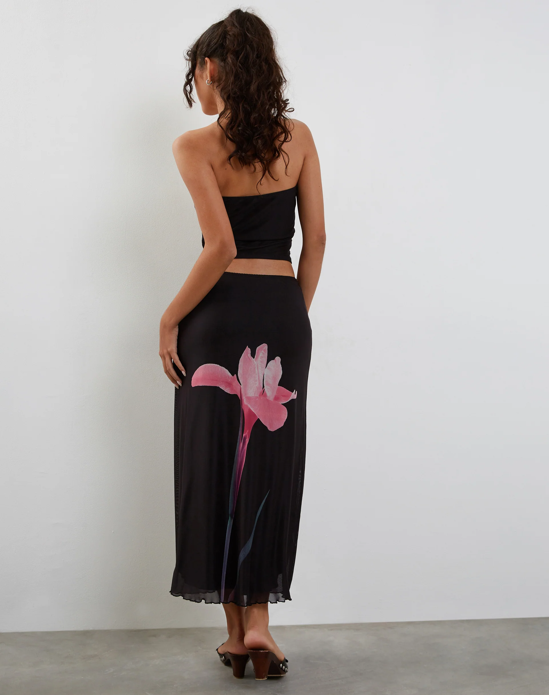 Lassie Midi Skirt in Black with Pink Flower Placement - Image 3