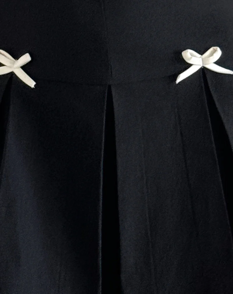 Radeta Mini Dress in Black with Ivory Bows - Image 5