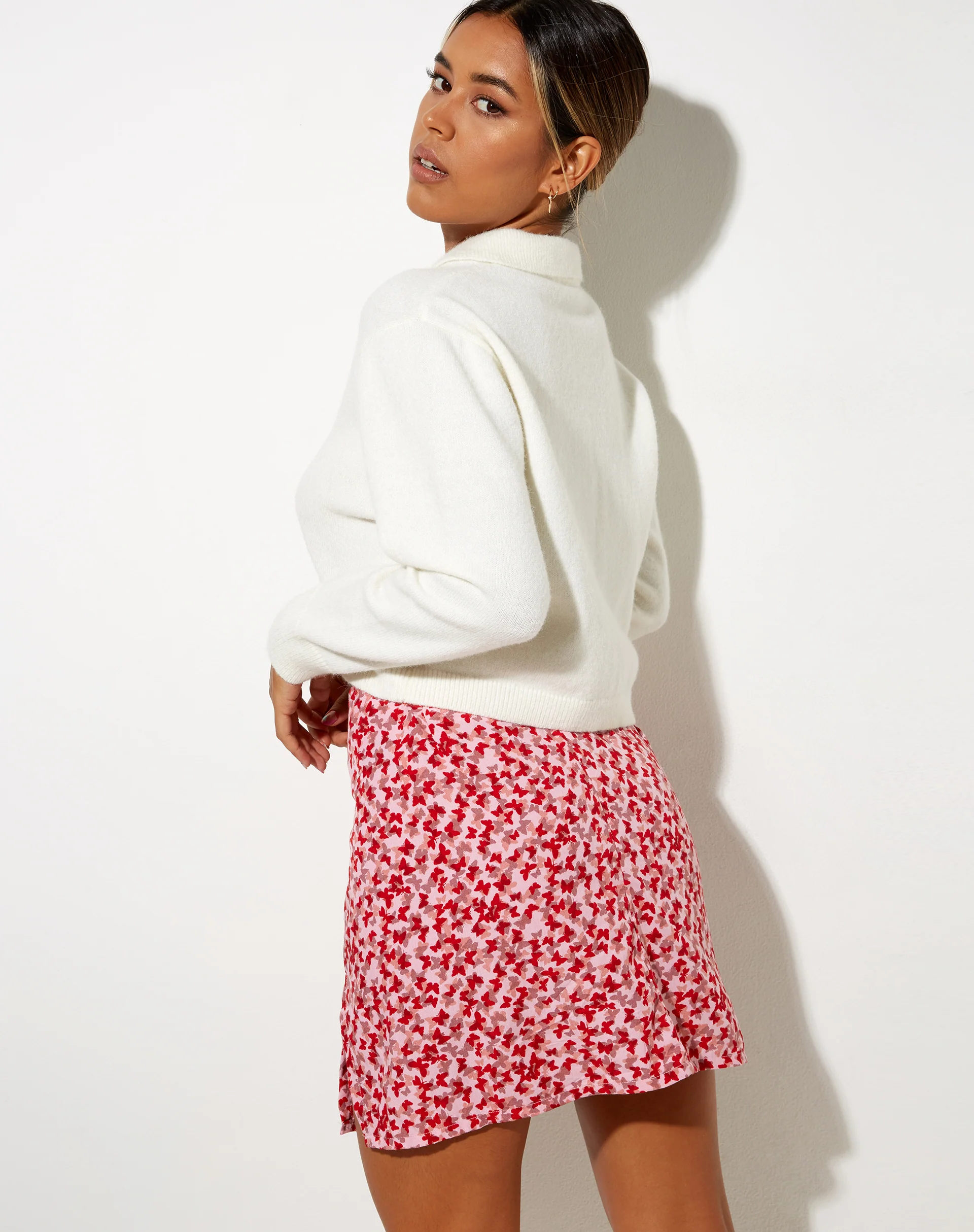 Sheny Mini Skirt in Ditsy Butterfly Peach and Red - Image 7
